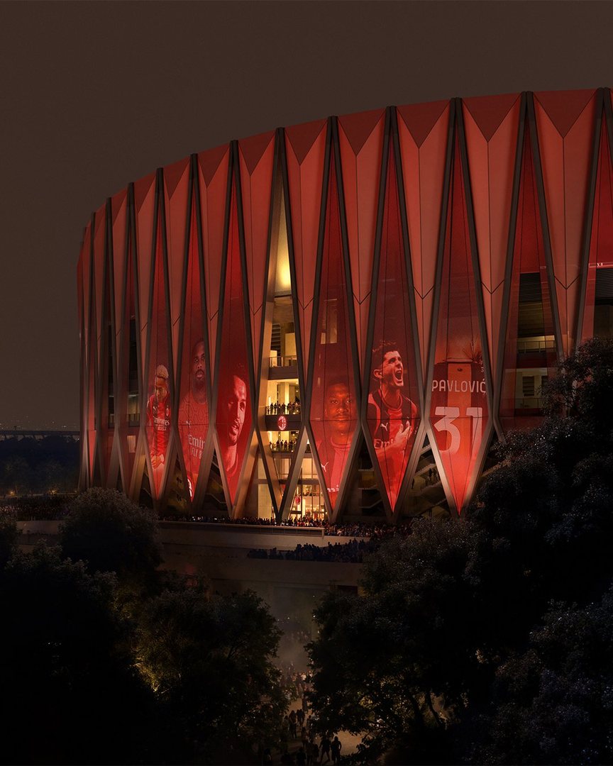 Facade of the Generali Stadium lit up in red with images of Milan players